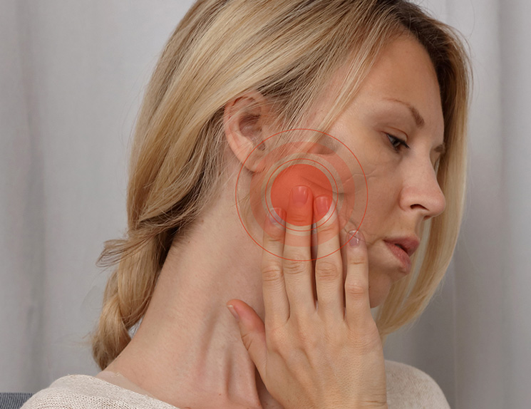 Woman with Jaw Joint Pain. Temporomandibular Joint Disorders