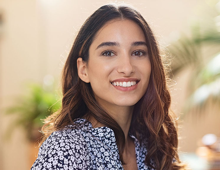 Happy young woman smiling